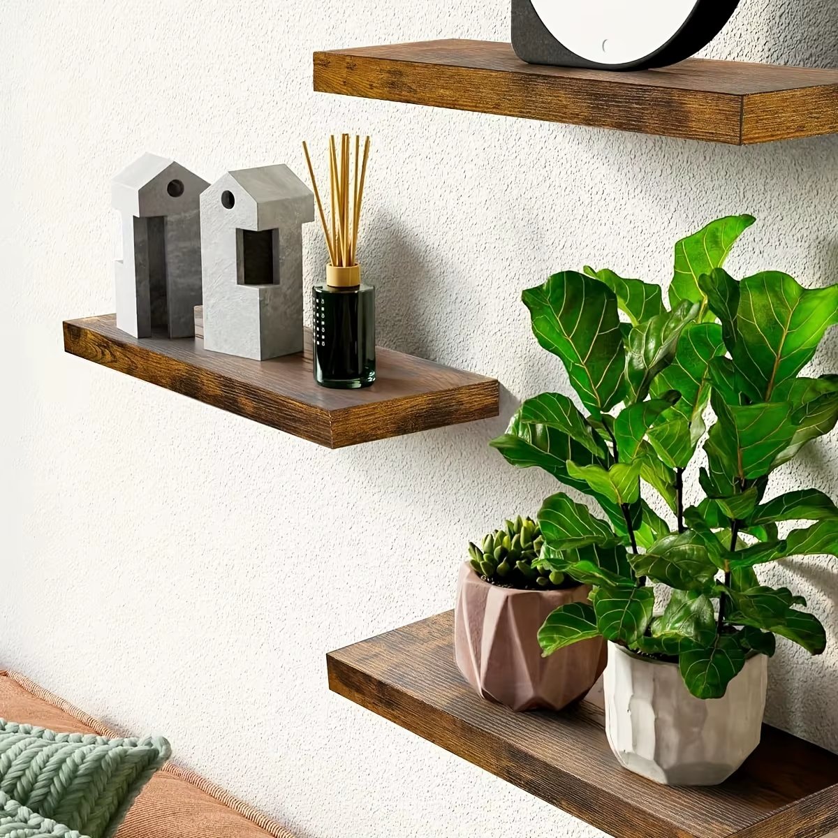 Floating wood shelf mounted on wall